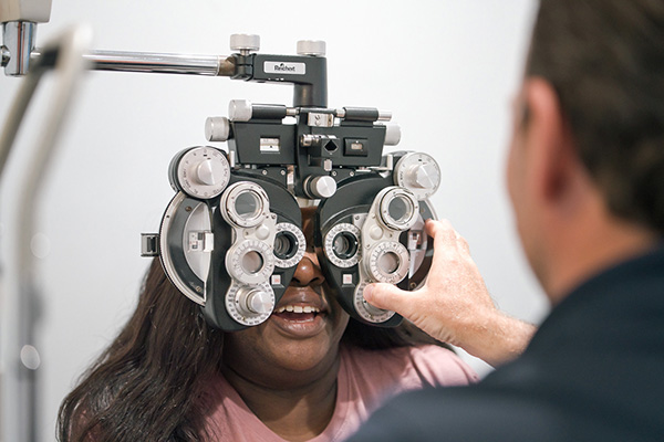 Woman getting a comprehensive eye exam at Lowcountry Eye Care